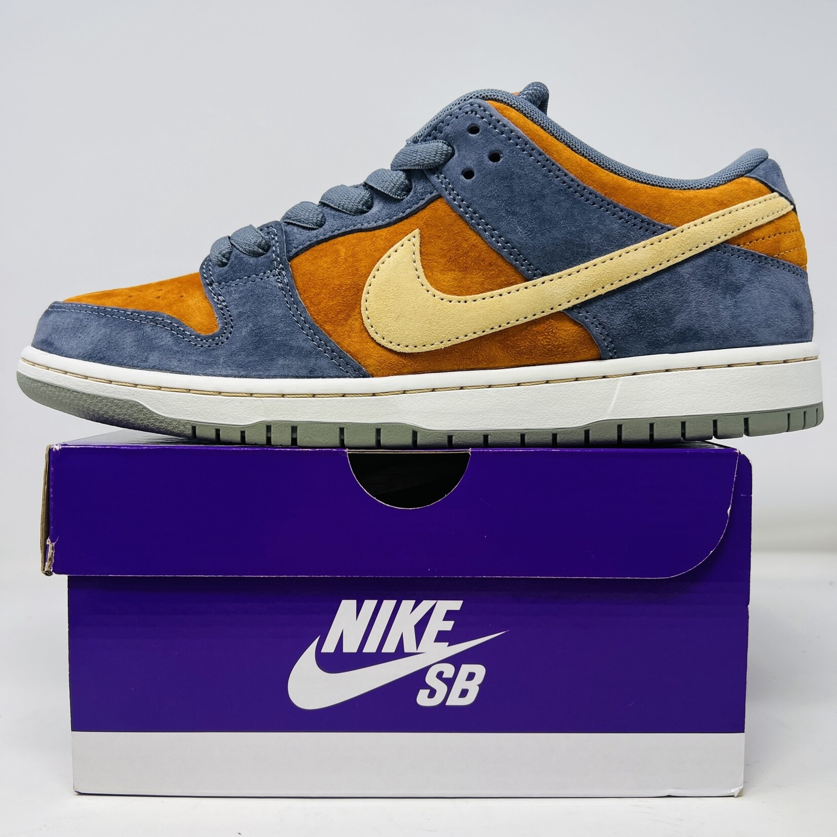 Nike SB Dunk Low Light Carbon Monarch Holy Ground Sneaker Shop Buy Sell Trade Sneakers