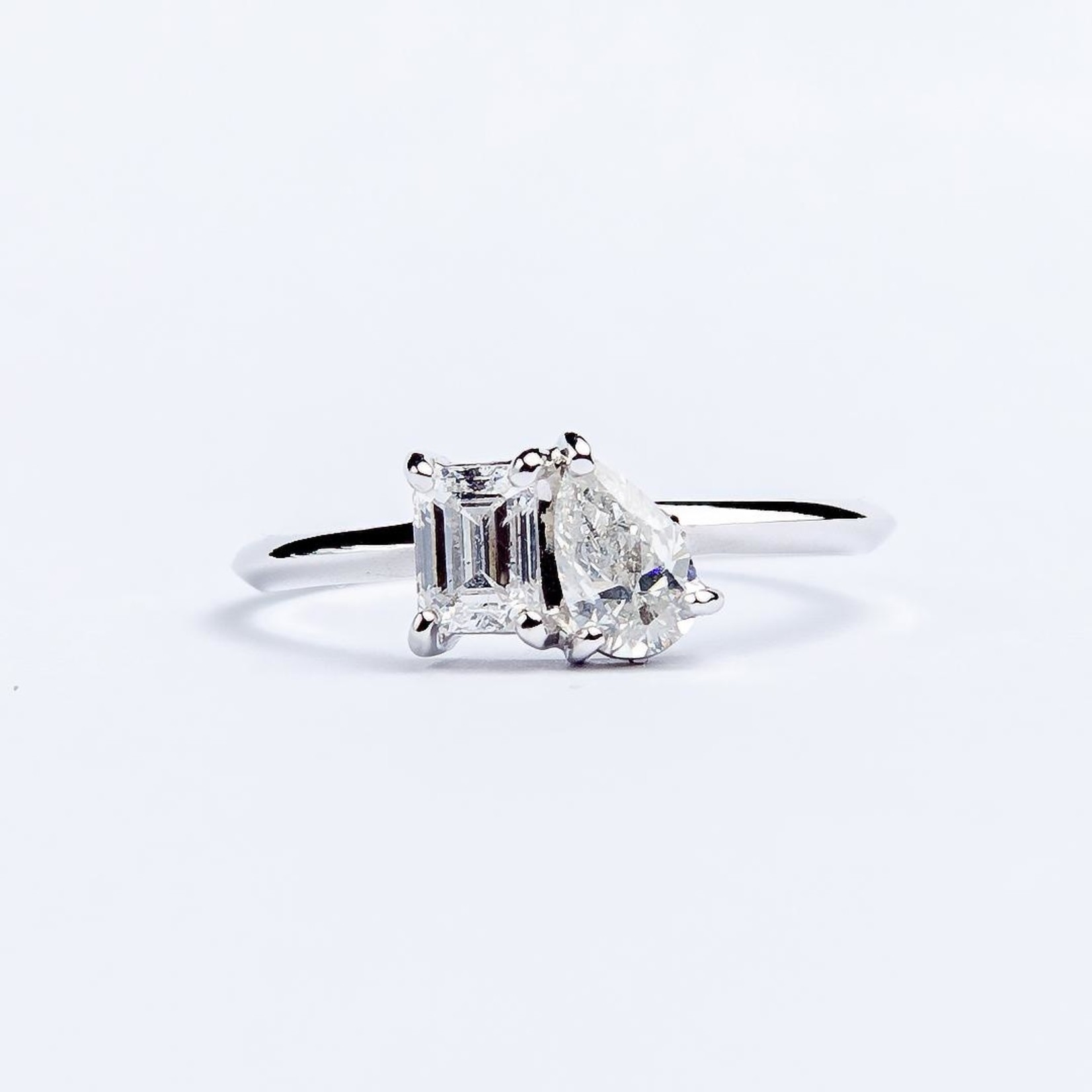 LXR Jewelry Ring 18KW Pear and Emerald cut DIA .73CT  wt 1.53g