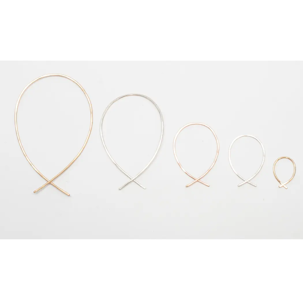 Twisted enamel hoops creme main image 1