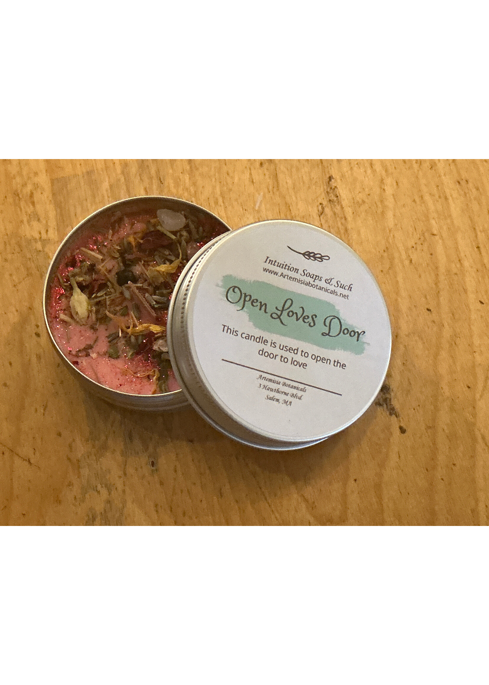 Candle tin open loves door