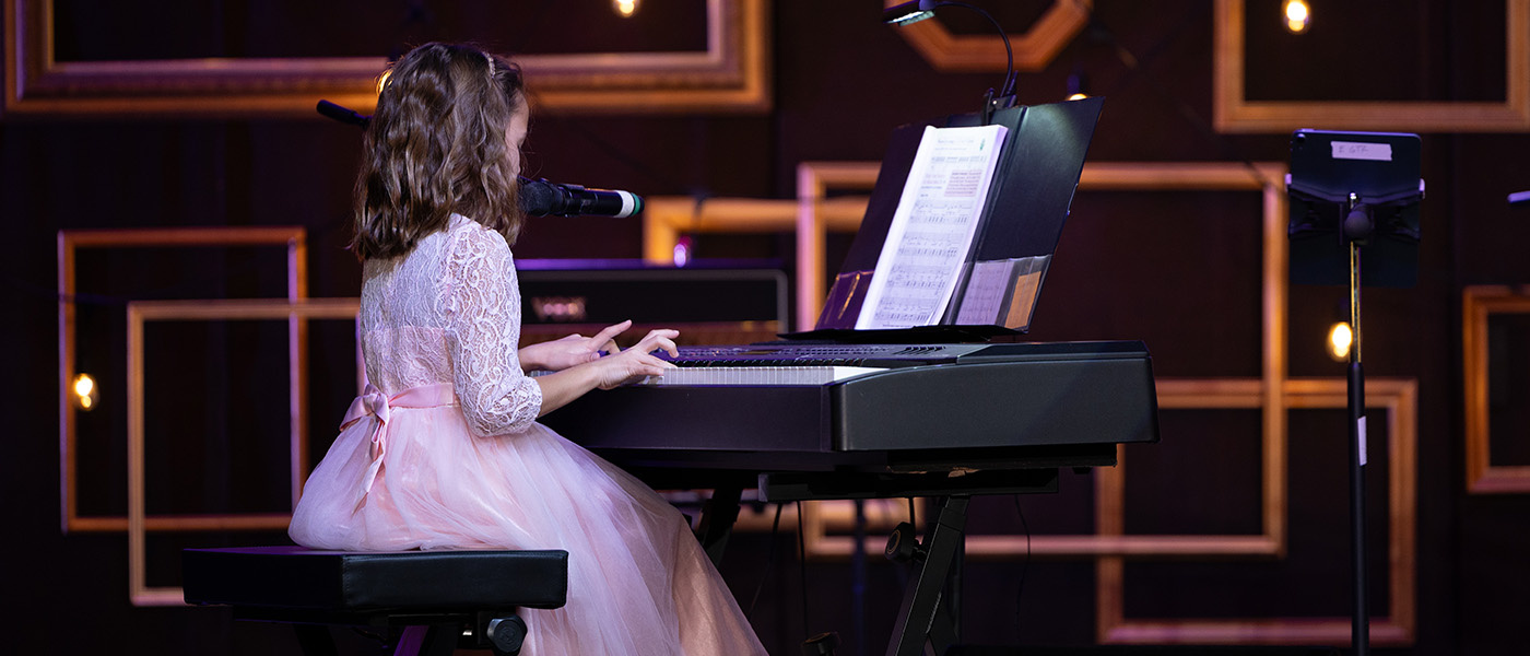 Young Girl Playing Piano