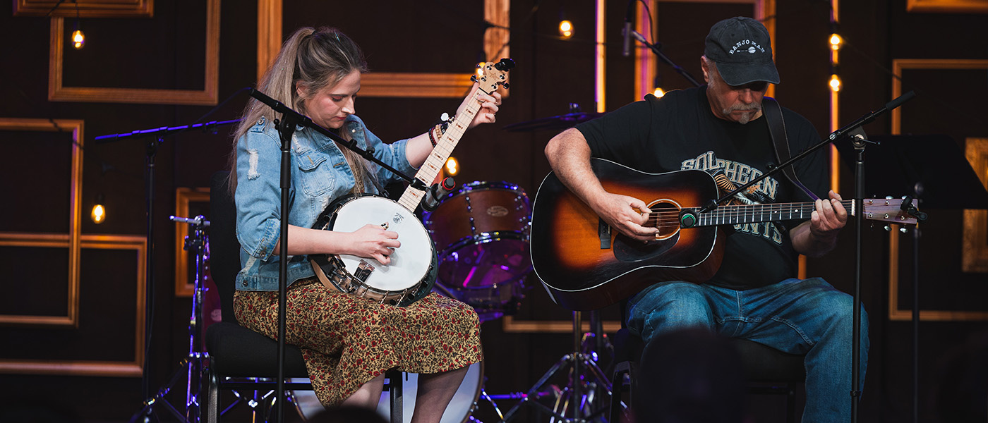 banjo student with teacher