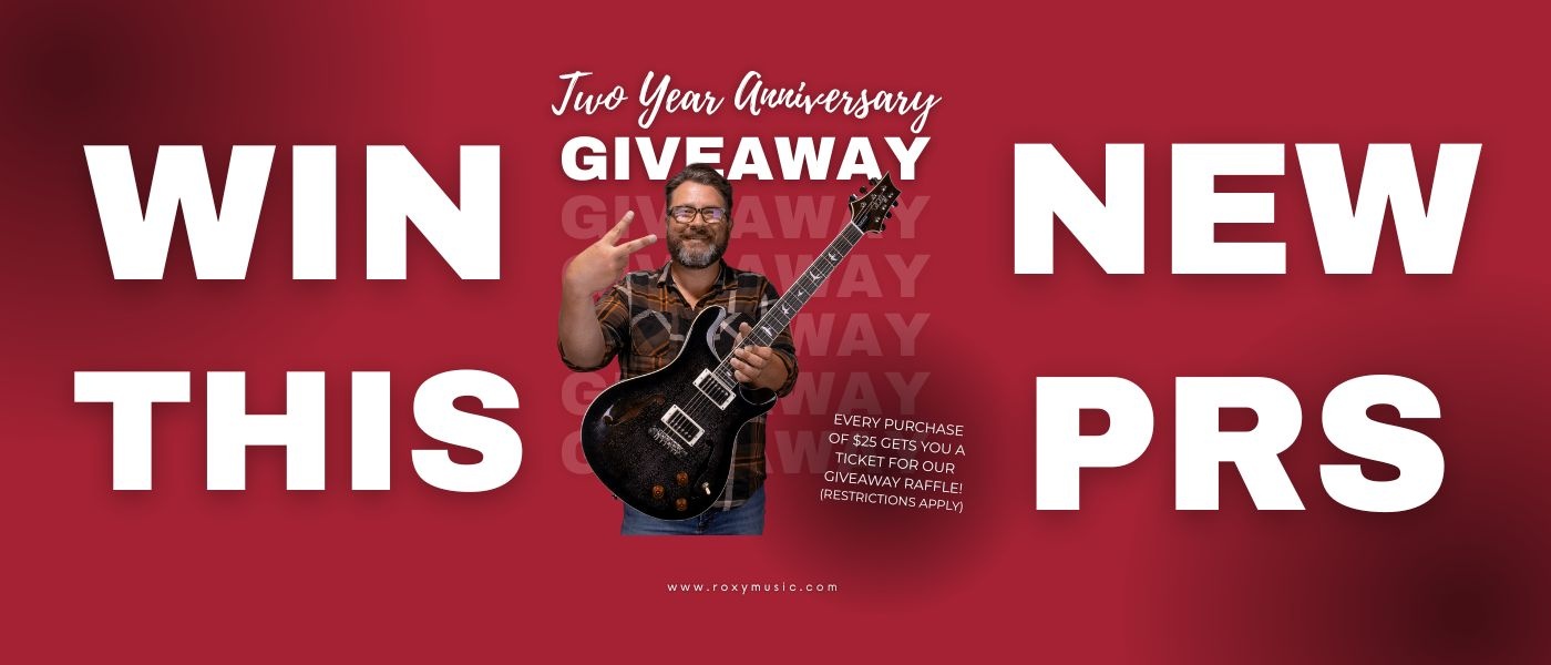 owner ken grace holding prs hollowbody electric guitar
