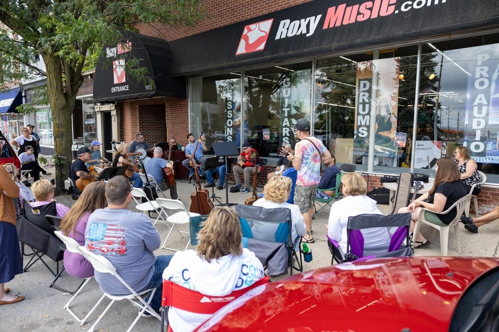 A crowd gathered outside Roxy Music for a community jam session