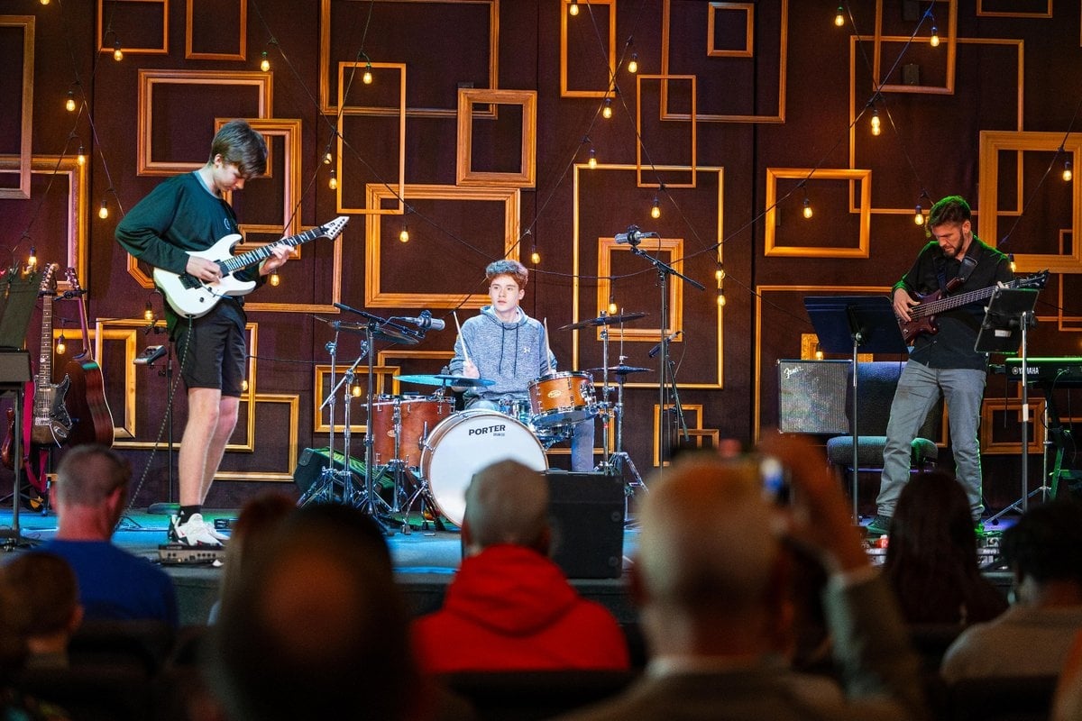 Students performing on stage during one of Roxy Music’s student concerts