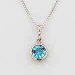 14KW Blue Topaz Filigree Pendant