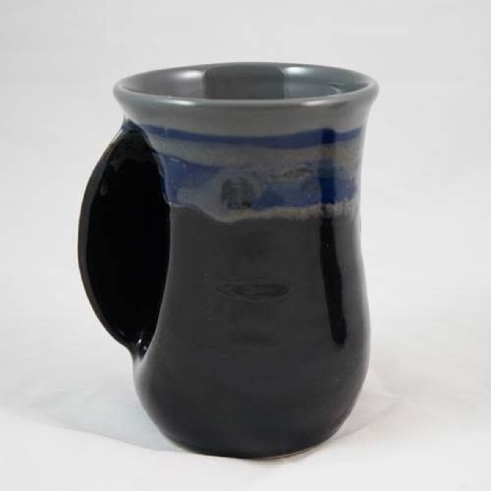 Clay in motion Handwarmer mug Left handed