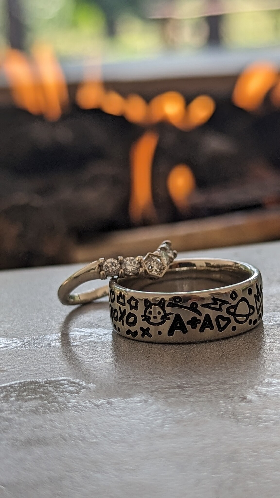 Modern Heirloom Wedding rings by the fire
