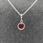 14KW Filigree Pendant w/ 5mm  Garnet on 16" Spiga