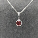 Modern Heirloom® 14KW Filigree Pendant w/ 5mm  Garnet on 16" Spiga