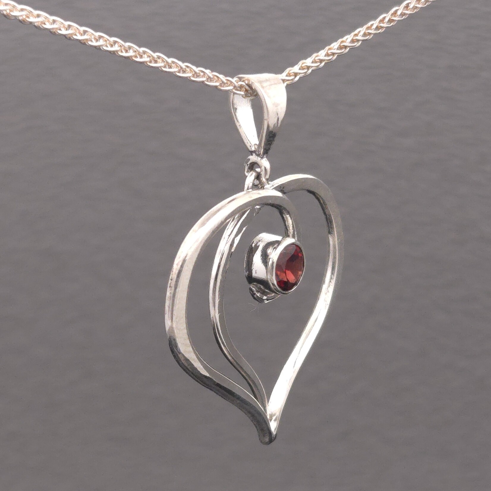 Modern Heirloom® Heart Forged Necklace with 5mm Garnet on a 22" Spiga chain