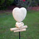 Garden Age Supply Stone Heart Garden Stake ( wall behind A )