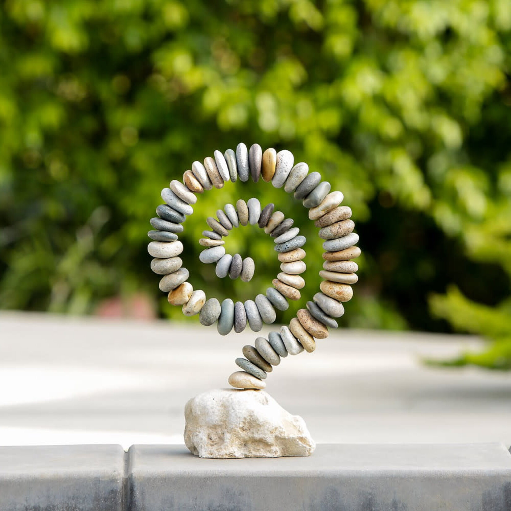 Garden Age Supply Beach Pebble Spiral on White Stone