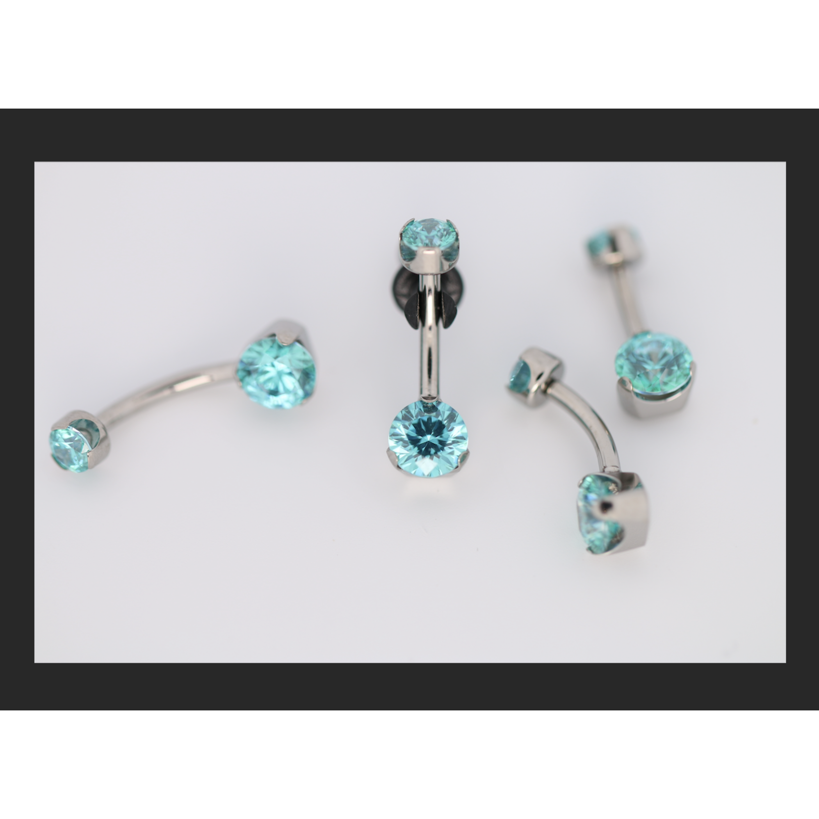 Anatometal 14g 3/8 brilliant cut round mint green prong set navel curve