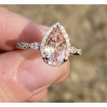 Aura Gold 14k rose gold ring featuring a. 1.75ct morganite, with .25ct in shank and halo