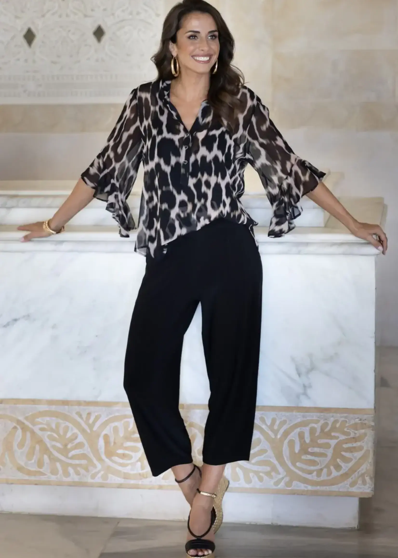 Frank Lyman Animal print top w/ bell sleeve
