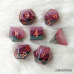 Fennek and Finch Shimmering Fluorite Green and Purple Layered Polyhedral 7 die set