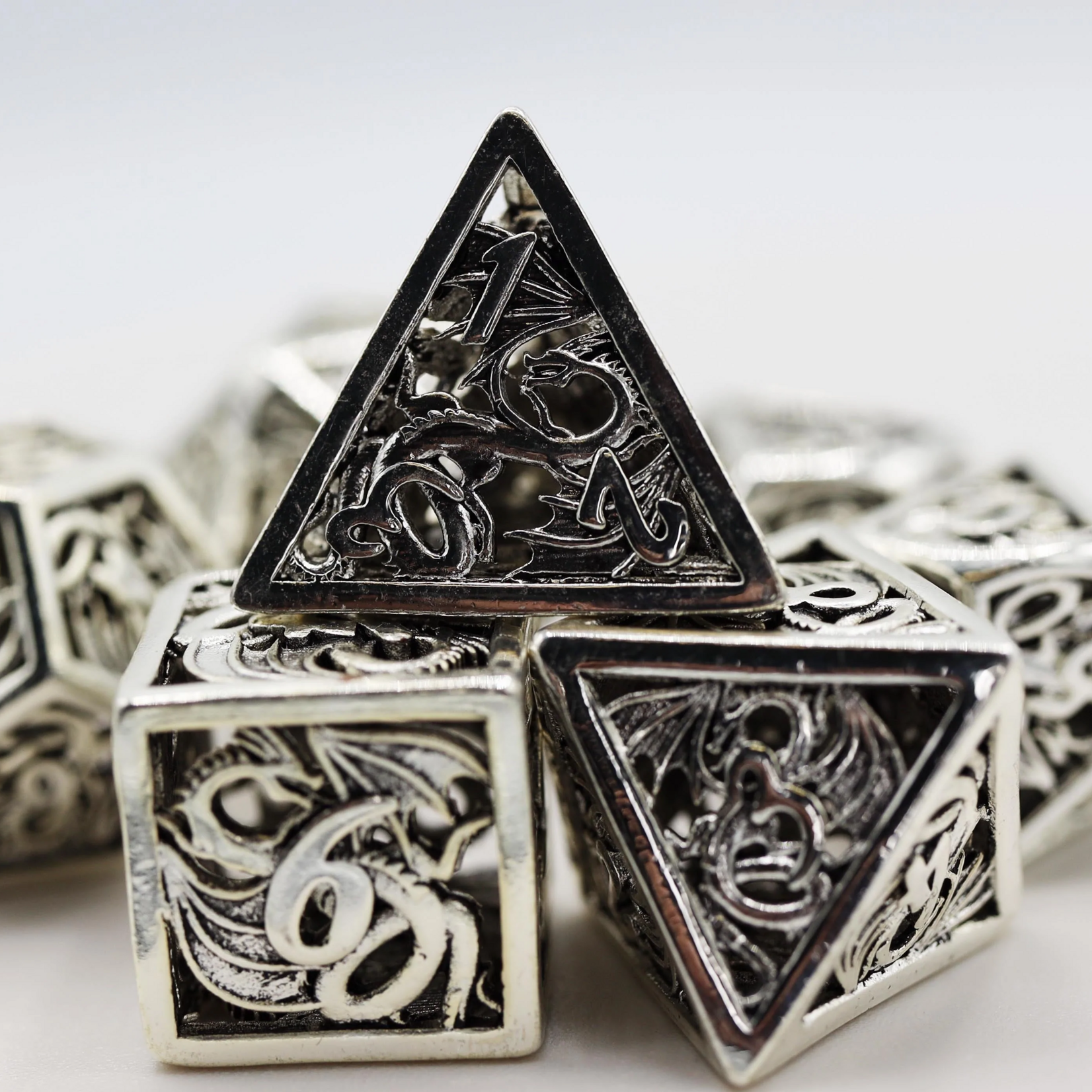 Foam Brain Games Hollow Mithril Dragon Metal Polyhedral 7 die set