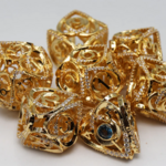 Foam Brain Games Hollow Hearts Jeweled Gold Metal RPG dice 7 die set