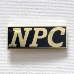 Strike Gently Co NPC Enamel Pin