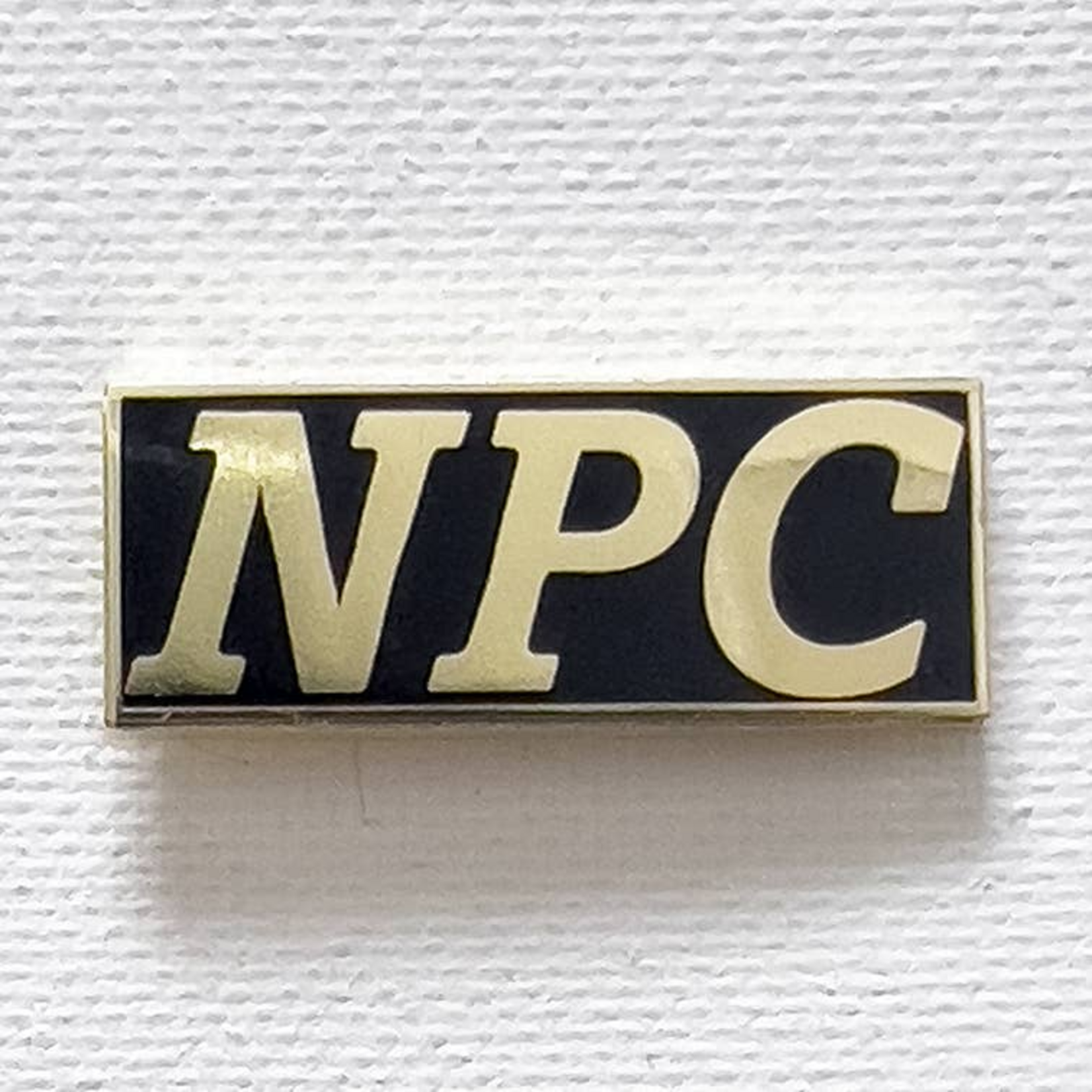 Strike Gently Co NPC Enamel Pin