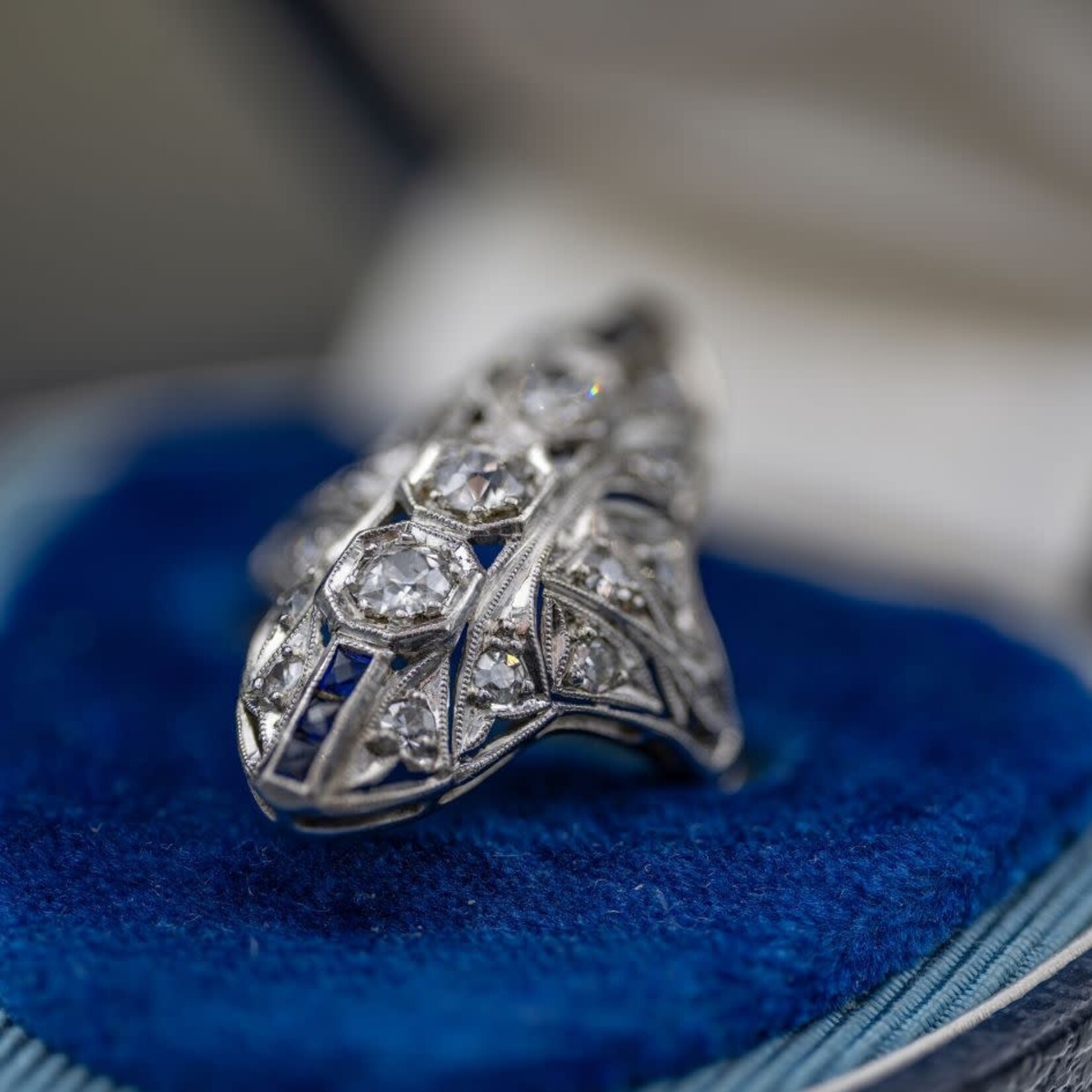 SJ Custom Jewelers Platinum "Art Deco" Ring with   .75cttw Diamond  & .10cttw Blue Sapphires