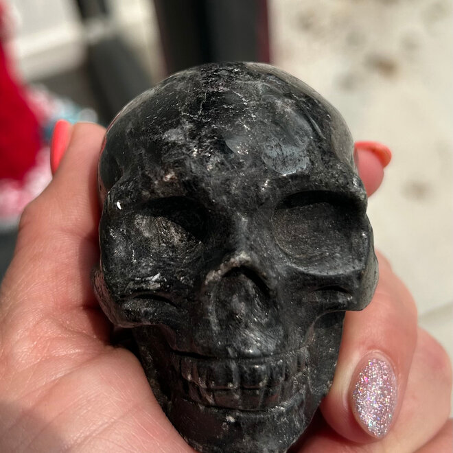 Garnet in Arfvedsonite (Fireworks Stone) Skull 12.2 oz Medium