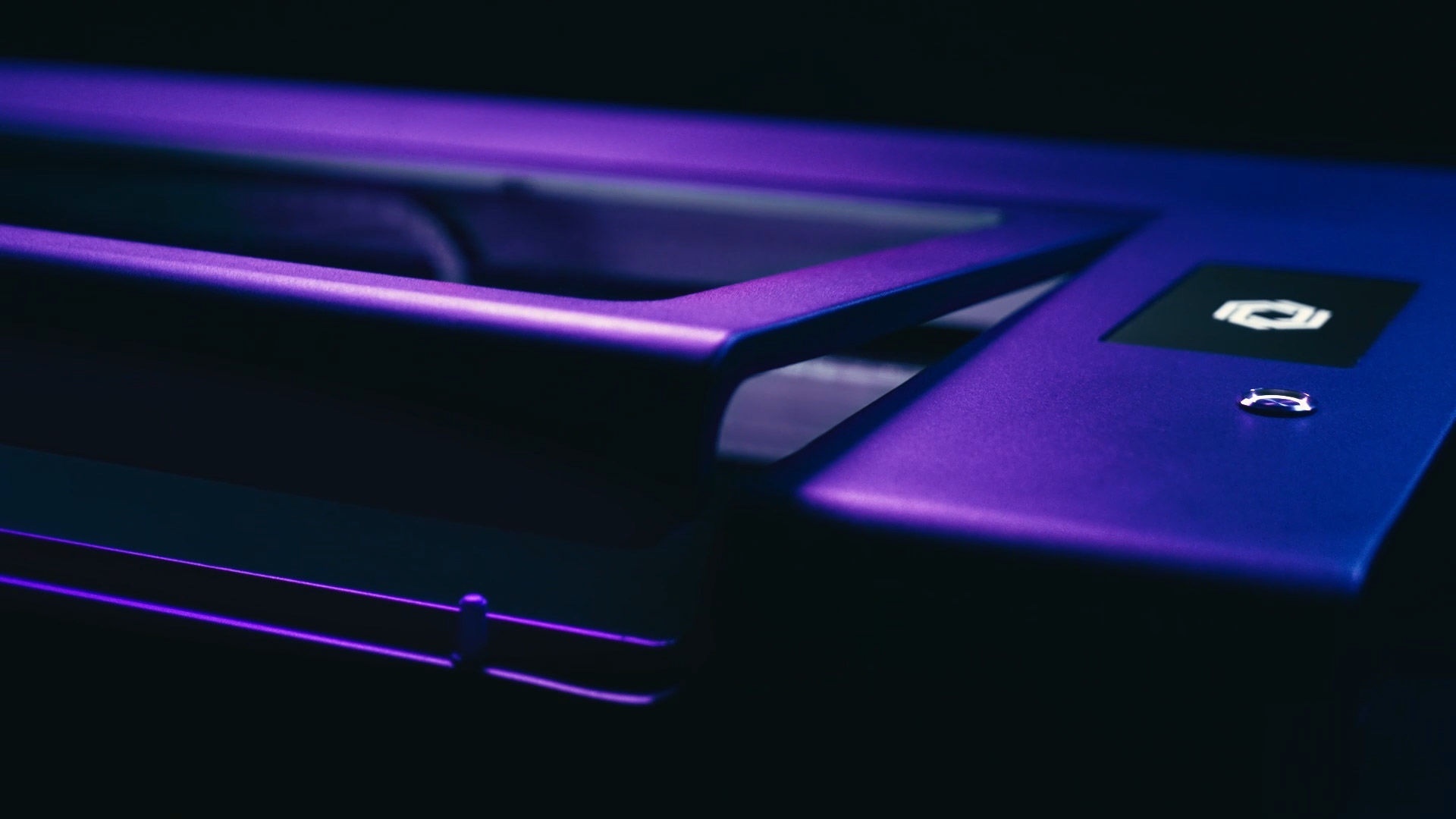 FLUX HEXA with an open lit in purple lighting.