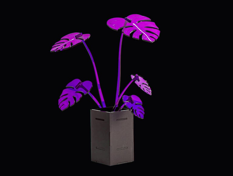 Ornamental plant in purple acrylic, laser cut by the FLUX HEXA.