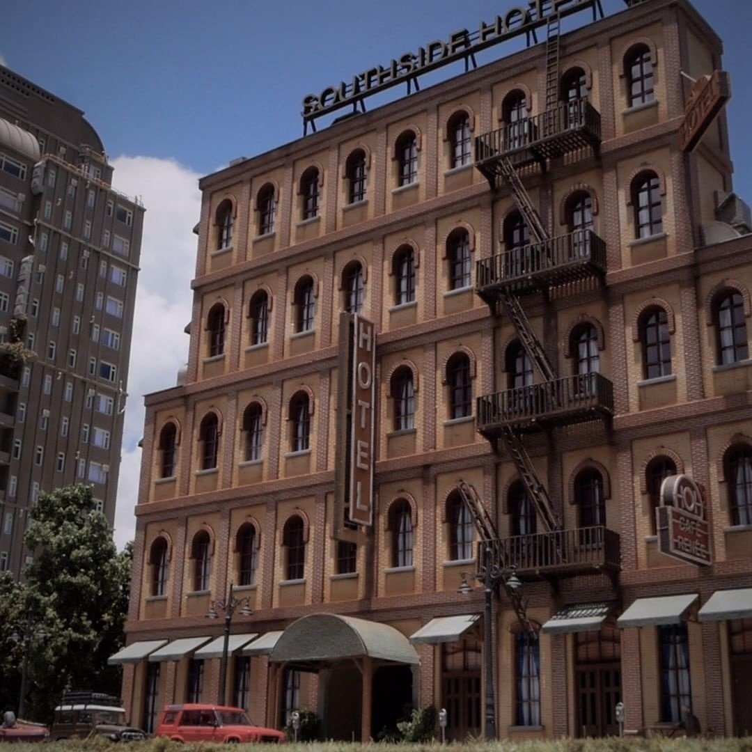 A miniature model of a hotel, made with a laser cutter