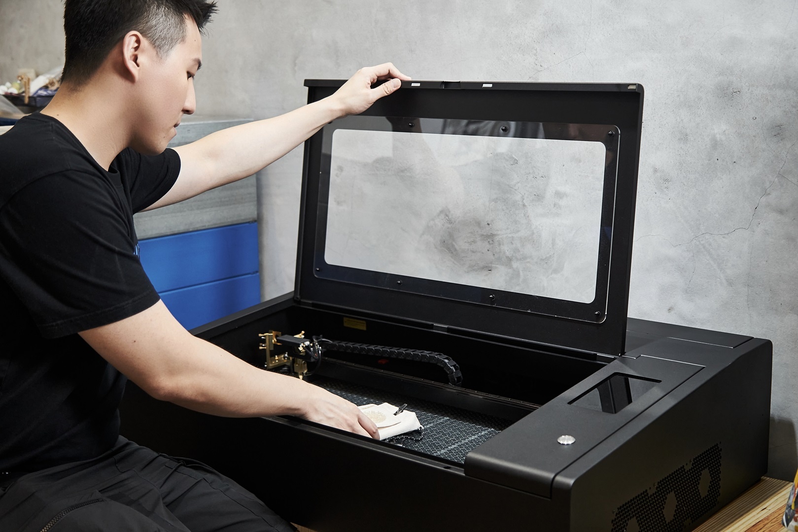 Tony Chen using the FLUX Beambox Pro laser cutter