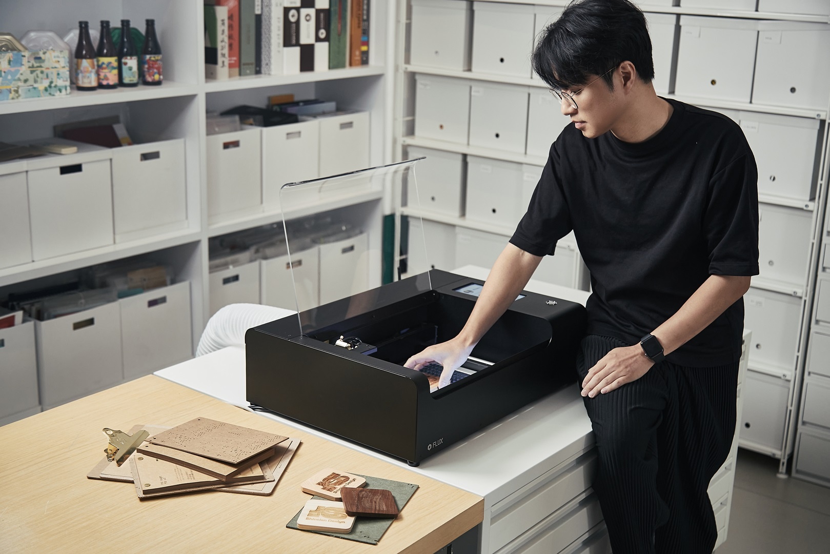 Leo using his FLUX Beamo laser engraver