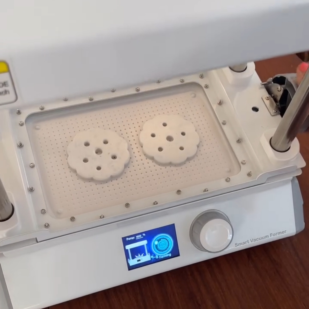 A HIPS sheet is vacuum formed over the original items