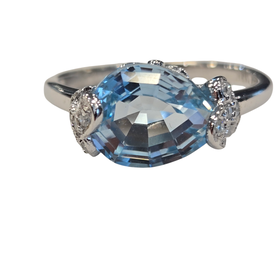 (R)14KW 2.69BT .11DIA WHITE GOLD BLUE TOPAZ AND DIAMOND RING