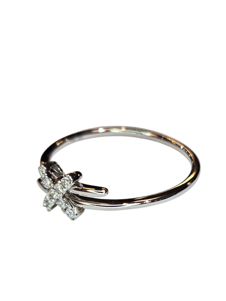 (X) 14KW .07CT DIA , WHITE GOLD "X" RING WITH 9 ROUND DIAMONDS