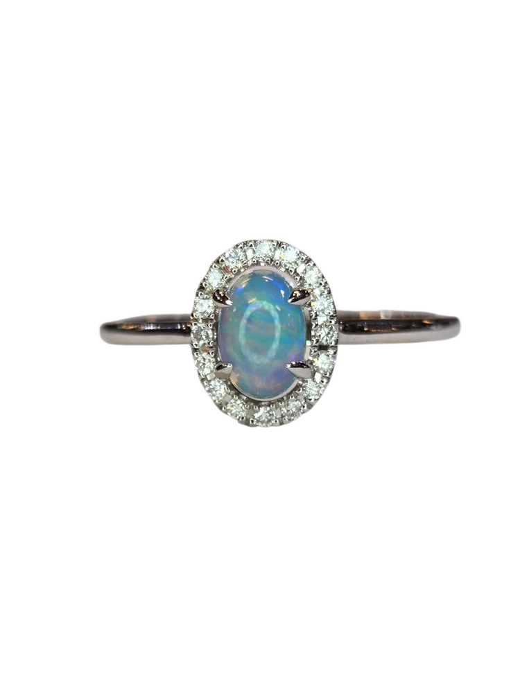 (X) 14KW .27OP .10DIA , WHITE GOLD OPAL RING WITH 16 ROUND DIAMONDS