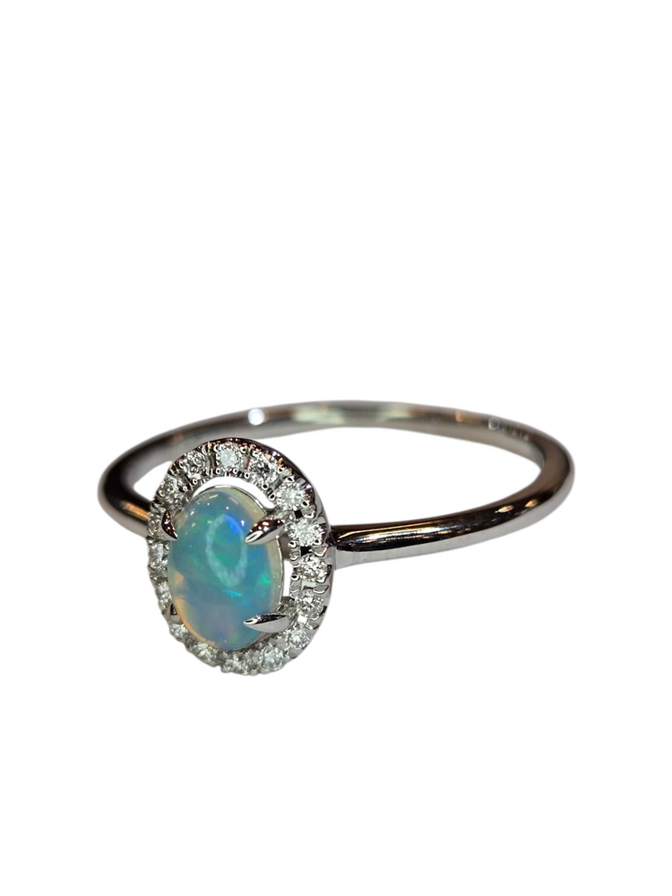 (X) 14KW .27OP .10DIA , WHITE GOLD OPAL RING WITH 16 ROUND DIAMONDS