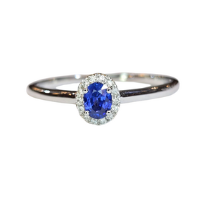 (X) 14KW .25SAP .04DIA , WHITE GOLD SAPPHIRE AND DIAMOND RING WITH 14 ROUNDS