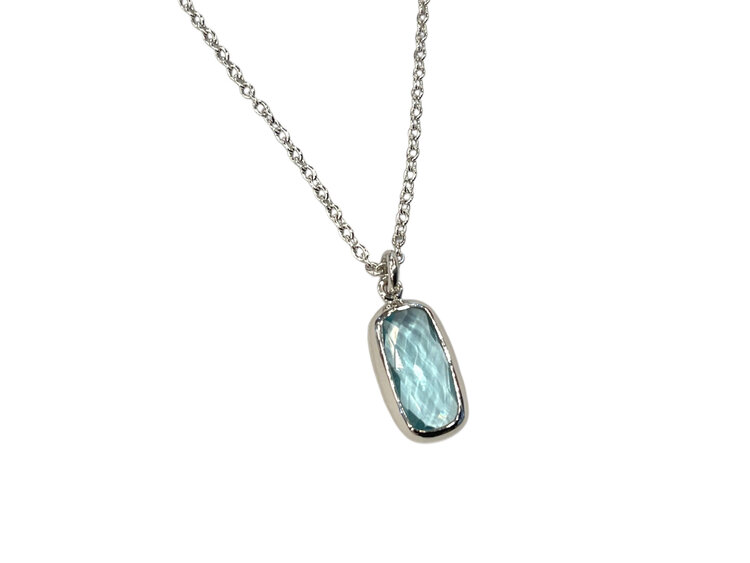 STEPHEN ESTELLE (R)925 BLUE TOPAZ BEZEL SET PENDANT ON ADJUSTABLE CHAIN