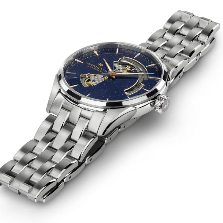 HAMILTON HAMILTON JAZZMASTER, Reference H32705140 Caliber H-10 Collection Jazzmaster Movement Automatic Case size 42mm Thickness (mm) 11.44 Dial color Blue aventurine Case material Stainless steel Crystal Sapphire Lug to lug 50mm Lug width 22mm Power reserve 80 ho