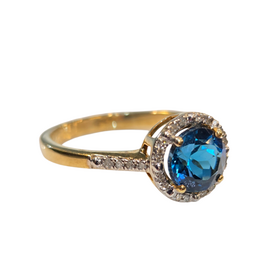 (Z) 10K 1CT BT .20DIA YELLOW GOLD RING WITH BLUE TOPAZ AND DIAMONDS