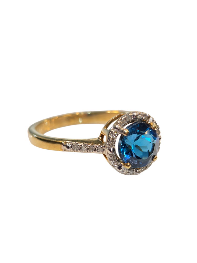 (Z) 10K 1CT BT .20DIA YELLOW GOLD RING WITH BLUE TOPAZ AND DIAMONDS