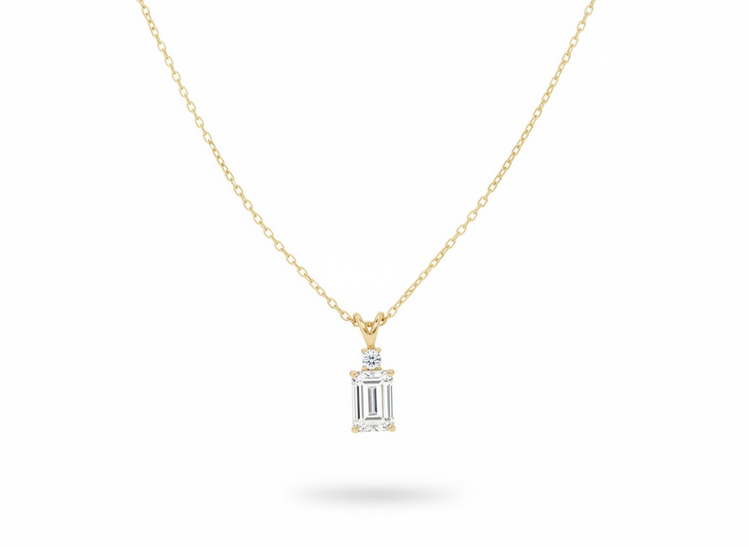 DIAMOND TRADERS INTERNATIONAL (Y)10KY LG .97CT EC .03CT RND D/VVS2-VS1 IGI CERT.#LG710579645 #LG710533893 1.0CTW LAB GROWN EMERALD & ROUND CUT DIAMOND 16+2 ADJUSTABLE FLAT CABLE CHAIN