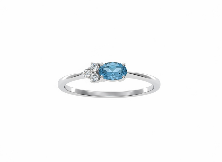 DIAMOND TRADERS INTERNATIONAL (Y)10KW .04DIA & TPZ ASYMMETRICAL OVAL BLUE TOPAZ WITH THREE ROUND DIAMONDS IN 14K WHITE GOLD