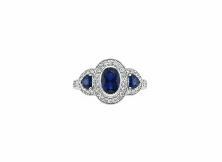 RYAN GEMS INC (Y)14KW 1.80SA .59DIA THREE STONE SETTING WITH OVAL AND TRIANGULAR SAPPHIRES ADORNED WITH DIAMONDS