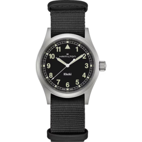HAMILTON HAMILTON Reference H69401430 Caliber F06.105 Collection Khaki Field Movement Quartz Case size 38mm Thickness (mm) 8.3 Dial color Black Case material Stainless steel Crystal Sapphire Lug to lug 46mm Lug width 20mm