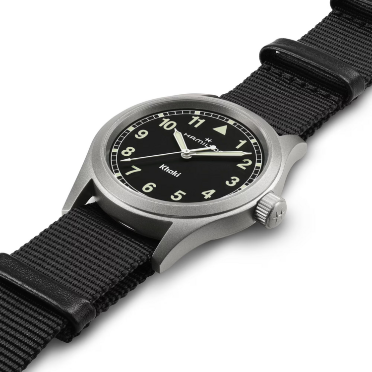 HAMILTON HAMILTON Reference H69401430 Caliber F06.105 Collection Khaki Field Movement Quartz Case size 38mm Thickness (mm) 8.3 Dial color Black Case material Stainless steel Crystal Sapphire Lug to lug 46mm Lug width 20mm