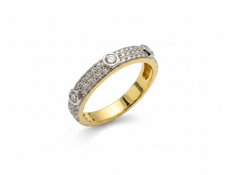 HJ NAMDAR (Y)14K .39DI PAVE OF DIAMONDS WITH THREE BEZEL SET ROUND DIAMONDS EMBEDDED IN 14K YELLOW GOLD BAND