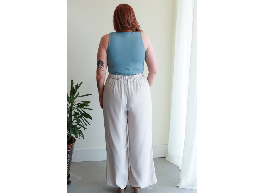 Apricot Acura pleated trousers