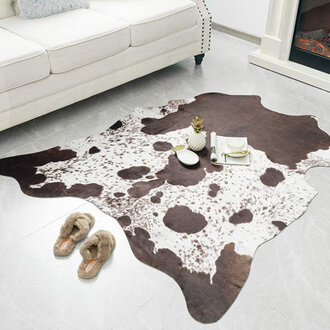 Ganote Animal Print Faux Cowhide Brown Area Rug